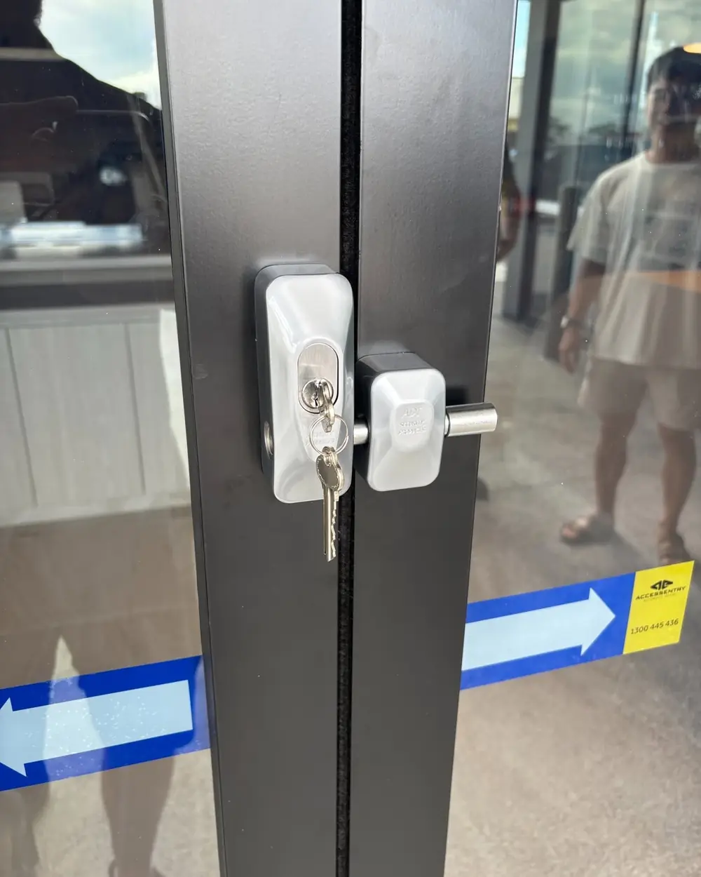 Keyed lock fitted to a glass commercial door