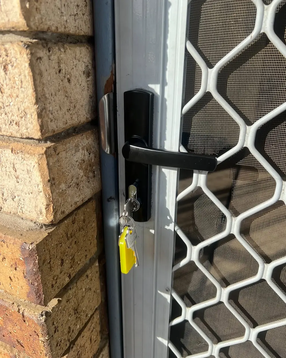 Keys in a security screen door lock